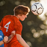 Effetti dei Colpi alla Testa sui Giocatori di Calcio: Studio su Miokine, BDNF e Performance Cognitiva